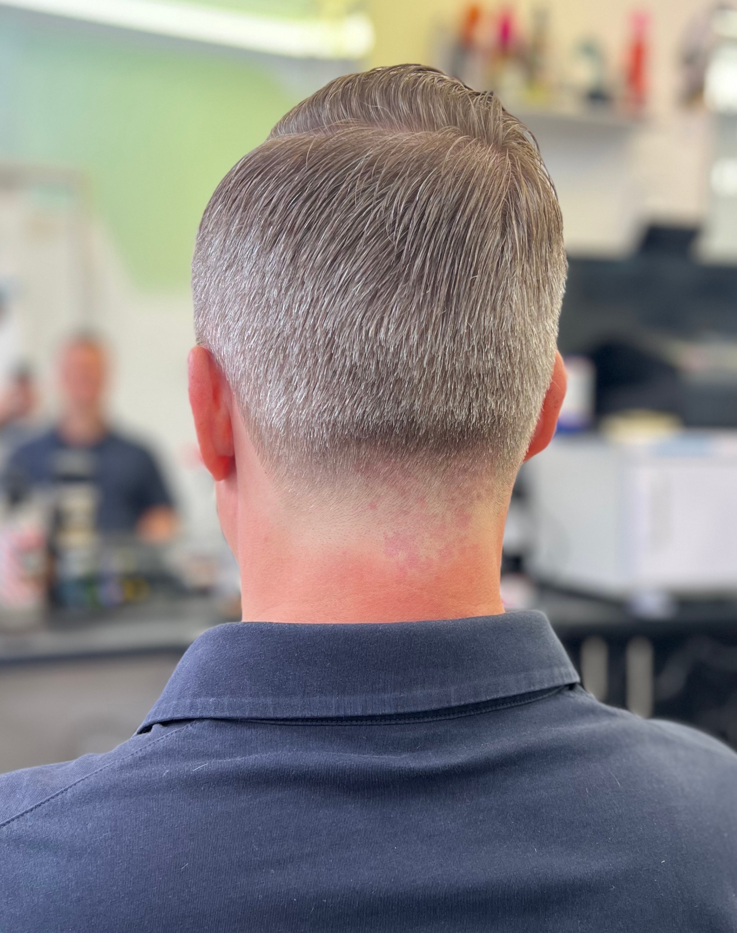 Classic taper fade from the back by Legends Barbers