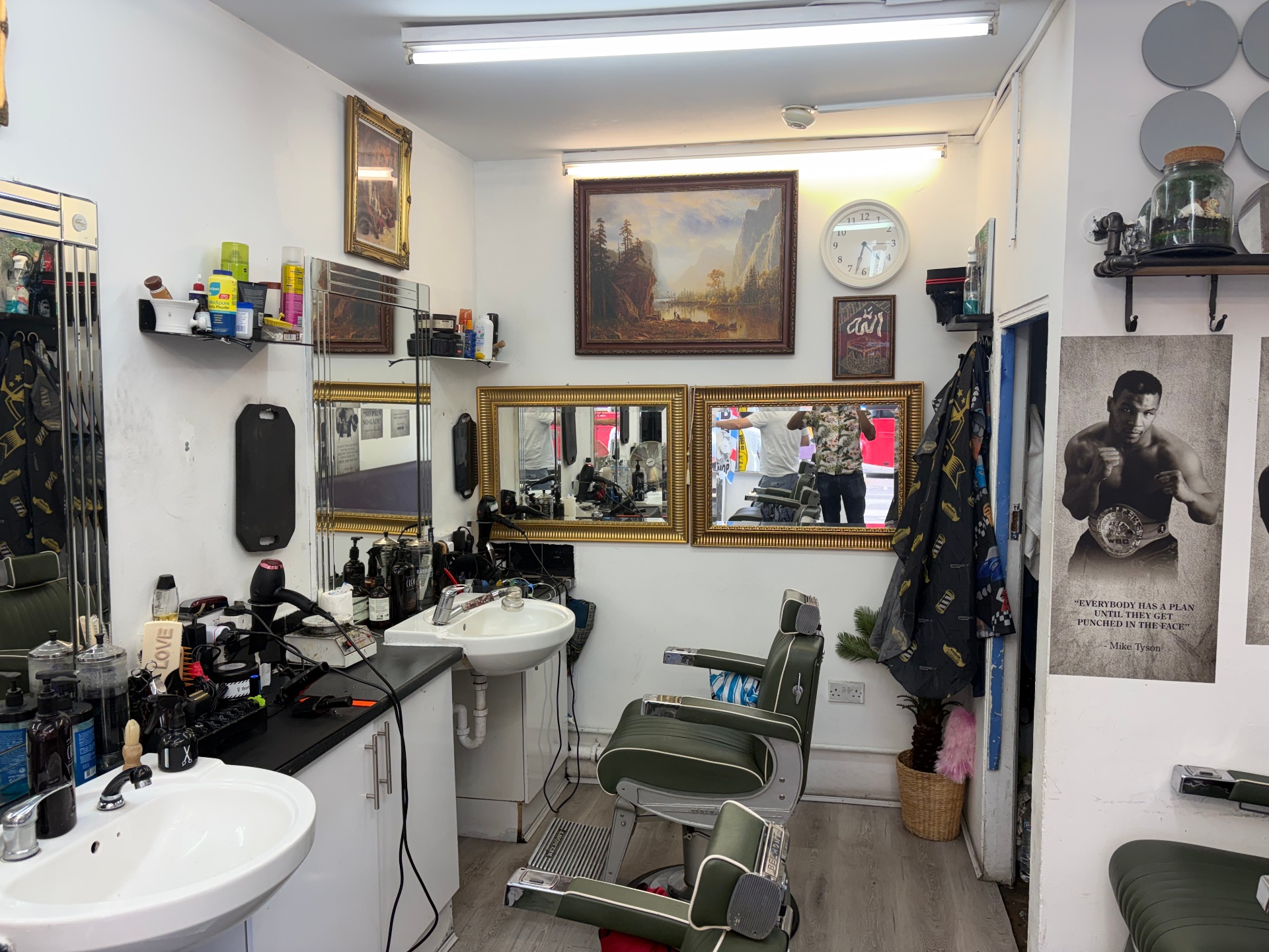 Inside Legends Barbers — mirrors, stations and tools